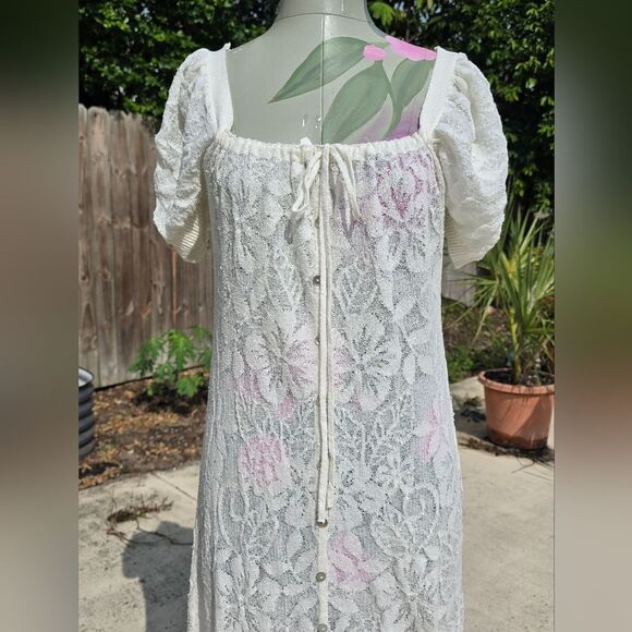 Elegant Zara dress features a unique knotted round neckline and charming - Picture 3 of 9